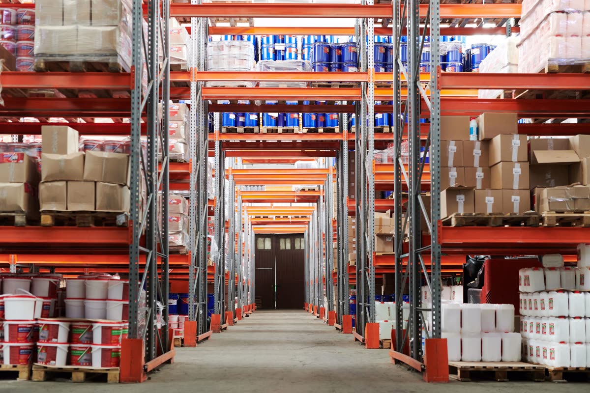 Warehouse shelves with stocked boxes